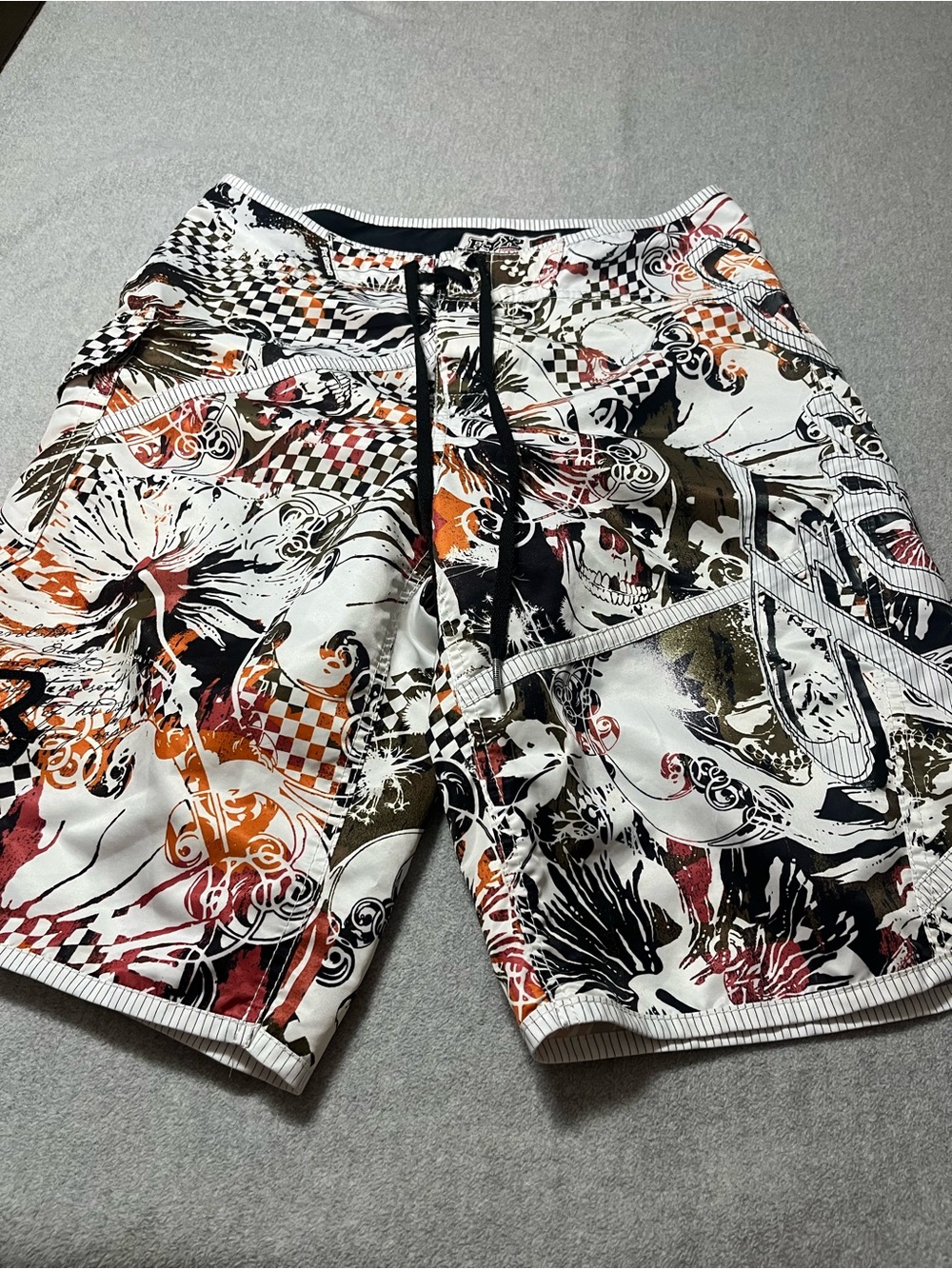 Fox Men’s White Swim Shorts with Black & Orange Graphic